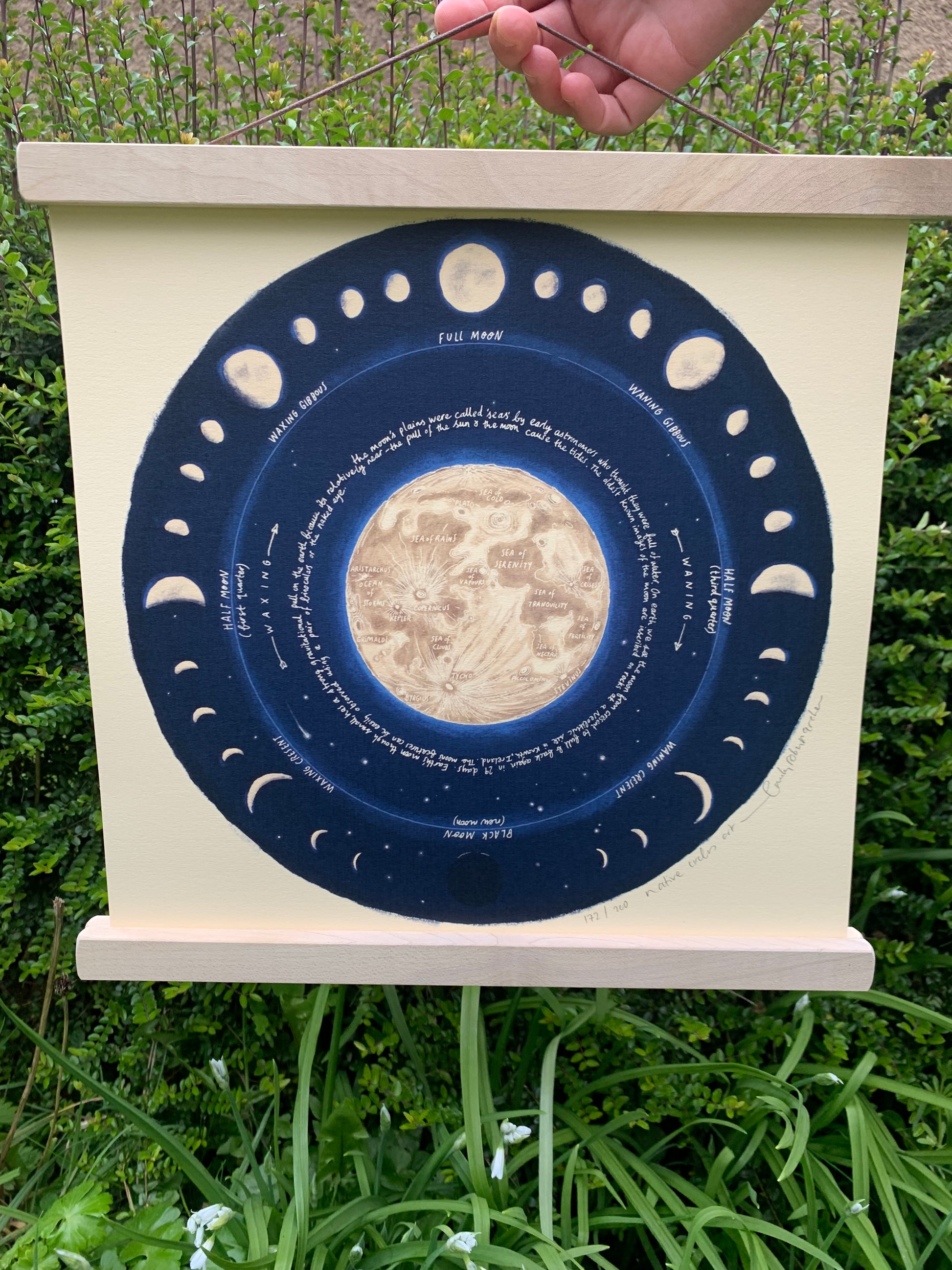 Magnetic print frame holding Native Circles Moon print in 300x300mm size